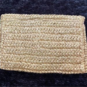Rattan clutch purse.